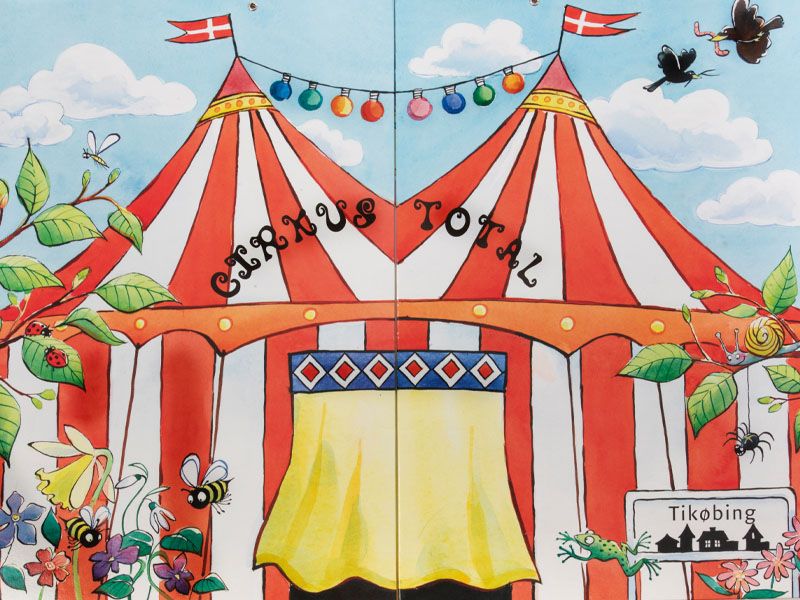 Pædagogisk Konsulent Alice Darville og Cirkus Total - Billede af et Cirkustelt med røde og hvide striber og flag på toppen